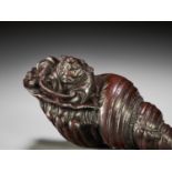 A FINE WOOD NETSUKE OF BENKEI