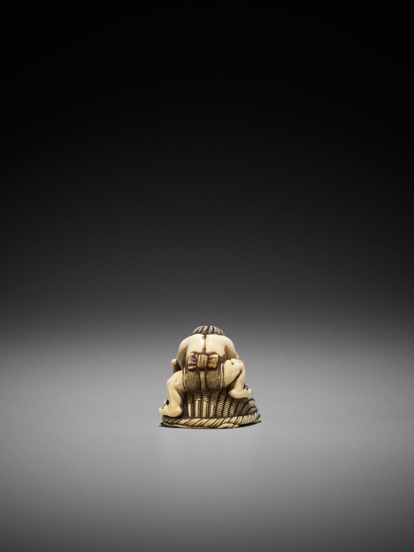 OKATORI: AN IVORY NETSUKE OF AN ONI TRAPPING SHOKI - Image 7 of 12