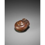 TADATOSHI: A FINE WOOD NETSUKE OF A SNAIL