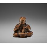 JOBUN: A RARE WOOD NETSUKE OF A MISO MAKER