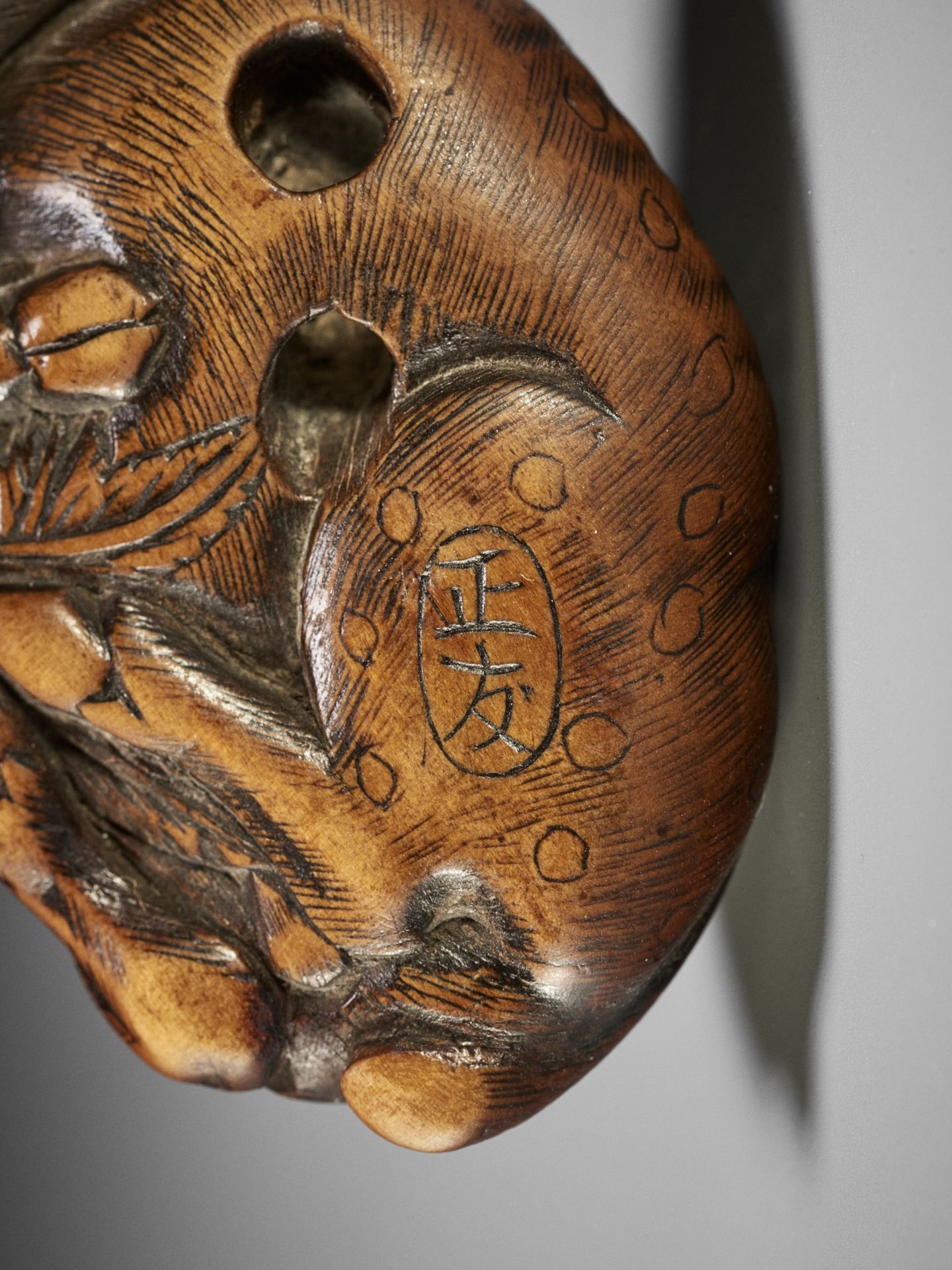 MASATOMO: A FINE WOOD NETSUKE OF A RECUMBENT DEER - Image 11 of 12