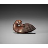 SHUMIN: A WOOD NETSUKE OF A PREENING GOOSE