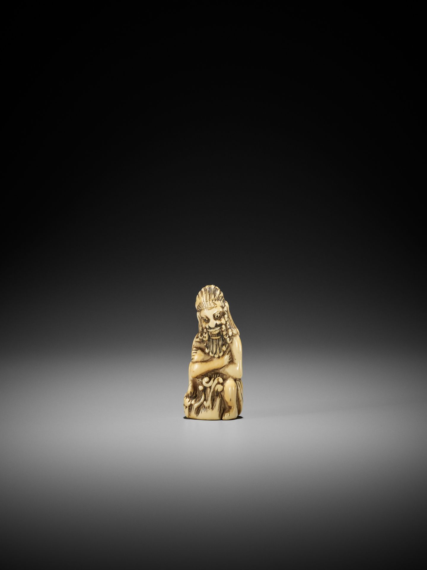 A RARE IVORY NETSUKE OF A FOREIGN DEVIL - Image 4 of 12