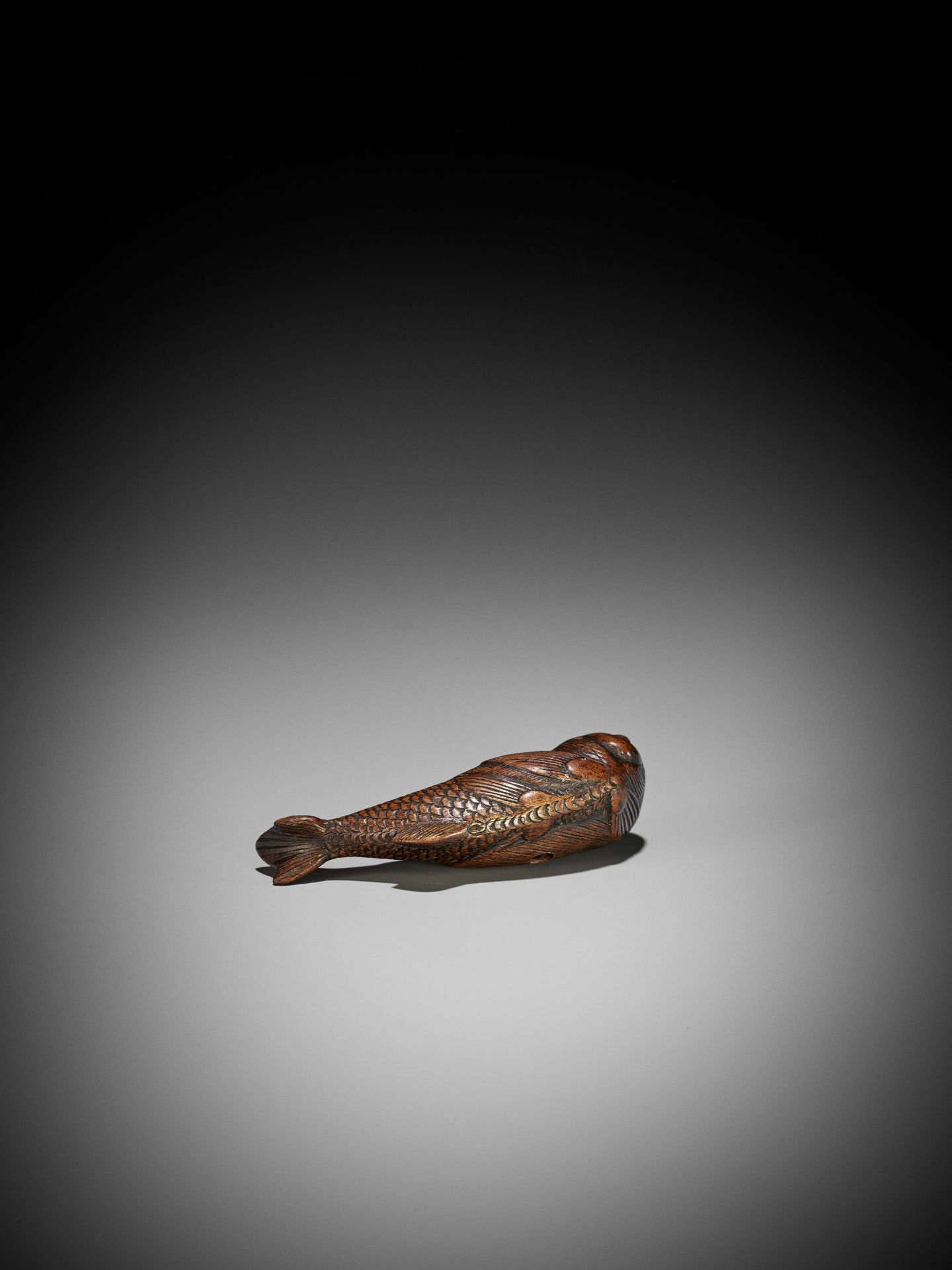 AN UNUSUAL WOOD NETSUKE OF A SWIMMING NINGYO (MERMAID) - Image 8 of 10