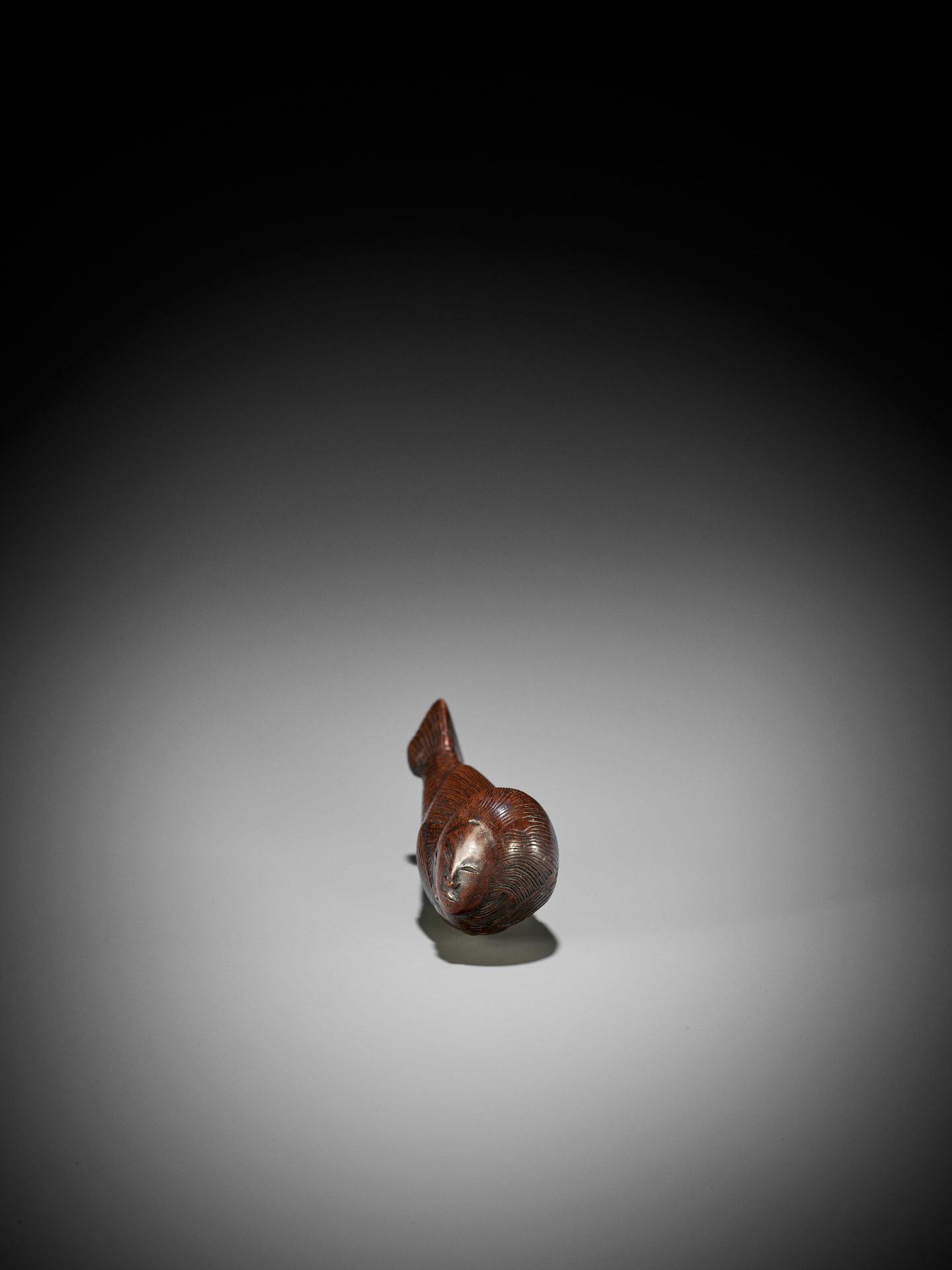 AN UNUSUAL WOOD NETSUKE OF A SWIMMING NINGYO (MERMAID) - Image 5 of 10