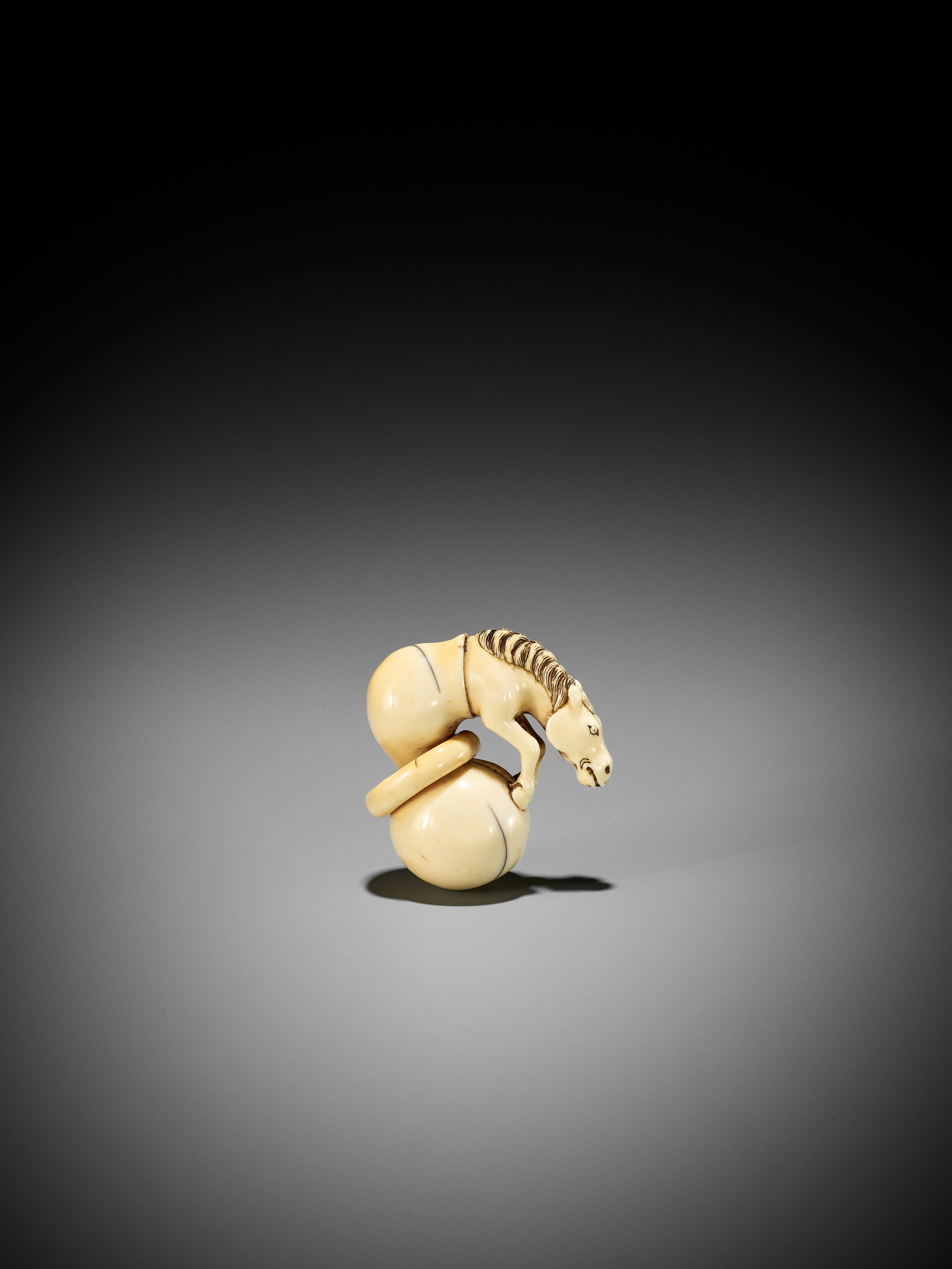 A GOOD IVORY NETSUKE OF CHOKARO'S HORSE EMERGING FROM A DOUBLE GOURD - Image 4 of 10