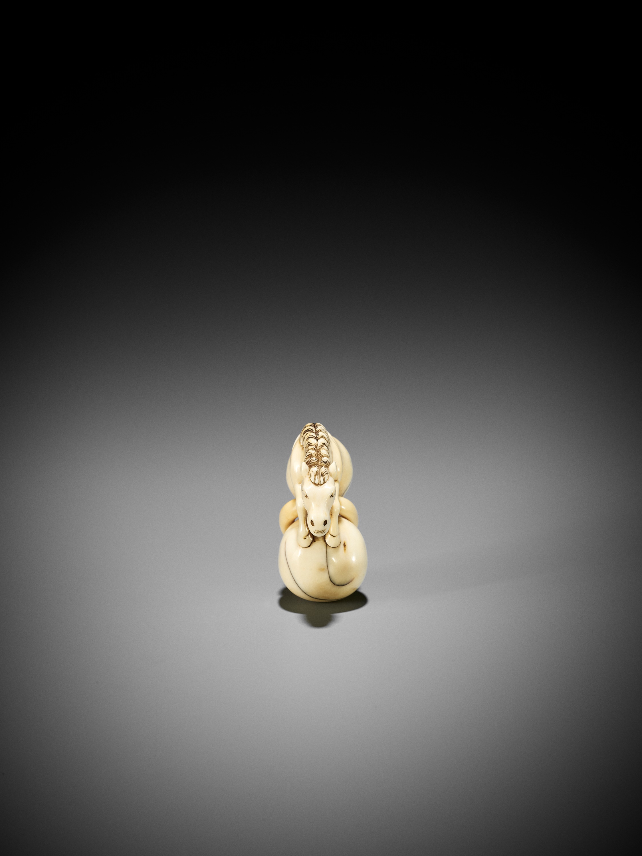 A GOOD IVORY NETSUKE OF CHOKARO'S HORSE EMERGING FROM A DOUBLE GOURD - Image 6 of 10