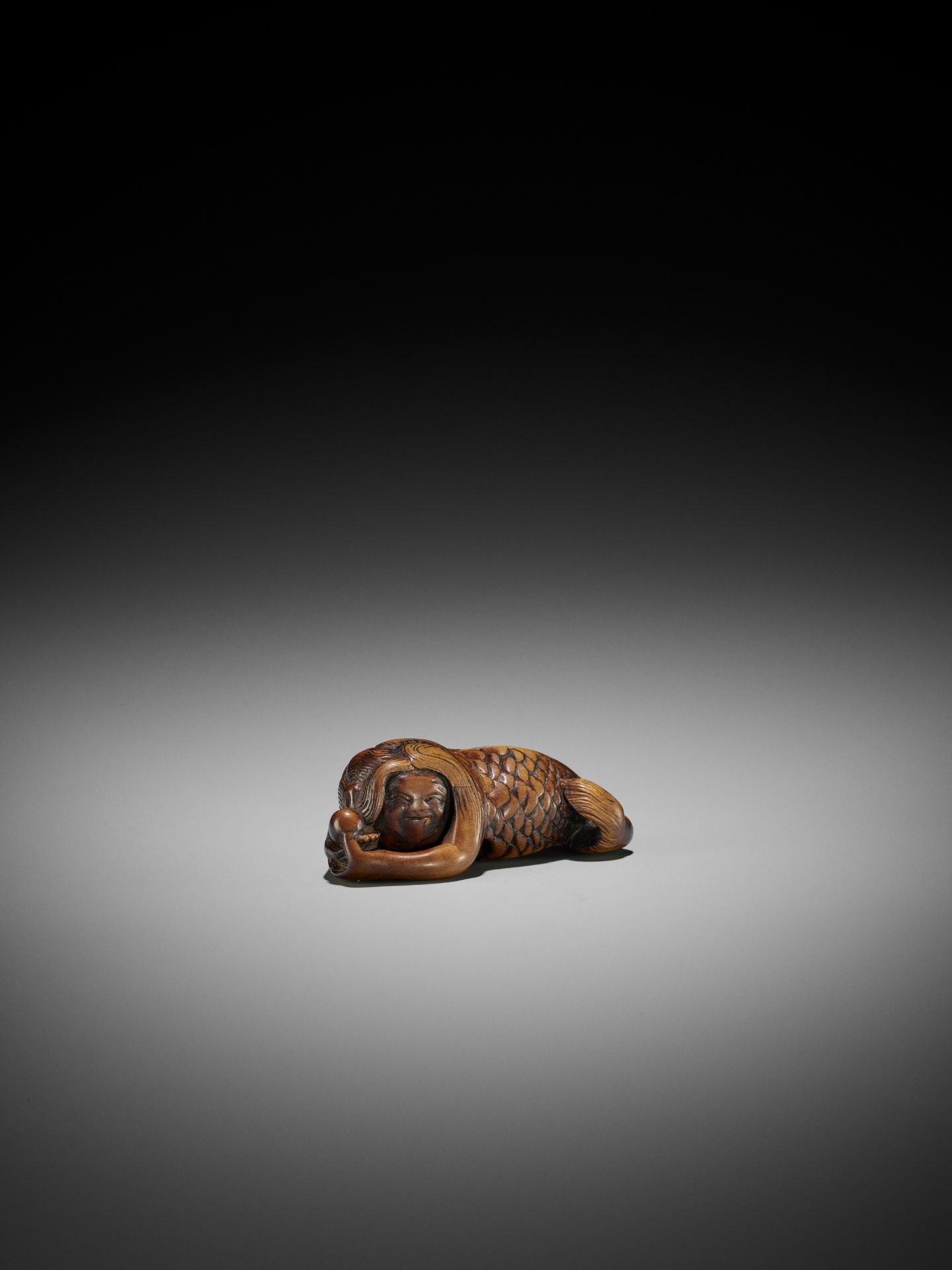 A RARE WOOD NETSUKE OF A MERMAN WITH TAMA - Image 6 of 9