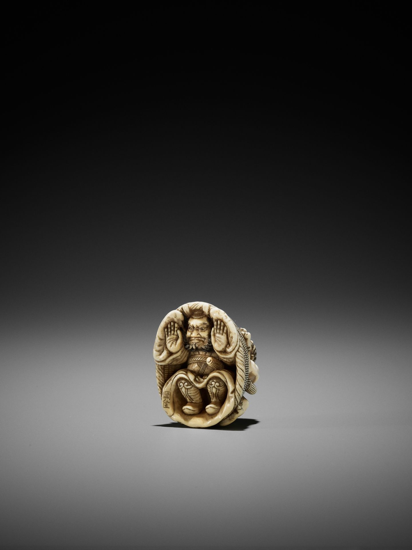 OKATORI: AN IVORY NETSUKE OF AN ONI TRAPPING SHOKI - Image 10 of 12