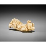 A SUPERB, LARGE AND RARE IVORY NETSUKE OF A TENNIN (BUDDHIST ANGEL)