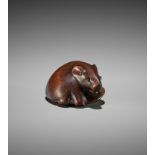 MOTOKAZU: A FINE WOOD NETSUKE OF A RAT WITH EDAMAME BEAN POD