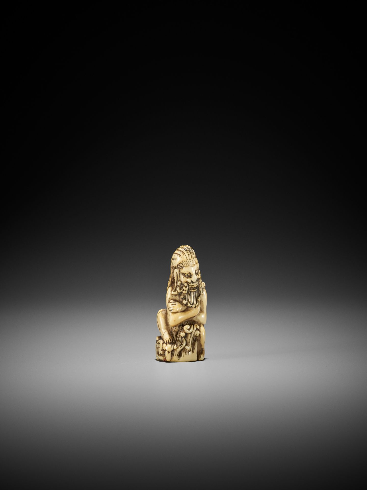 A RARE IVORY NETSUKE OF A FOREIGN DEVIL - Image 7 of 12