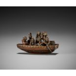 IKKOSAI: A WOOD NETSUKE OF TRAVELERS IN A FERRYBOAT