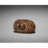 SHUGETSU: A RARE WOOD NETSUKE OF HOTEI TRAPPED IN HIS BAG