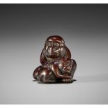 SHUGYOKU: A WOOD NETSUKE OF A MONKEY AND YOUNG