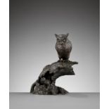 A BRONZE OKIMONO GROUP OF AN OWL AND MONKEY