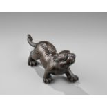 AN UNUSUAL MASSIVE BRONZE OKIMONO OF A TIGER