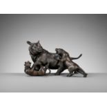 SEIYA: A RARE BRONZE OKIMONO OF A RHINOCEROS AND TIGERS