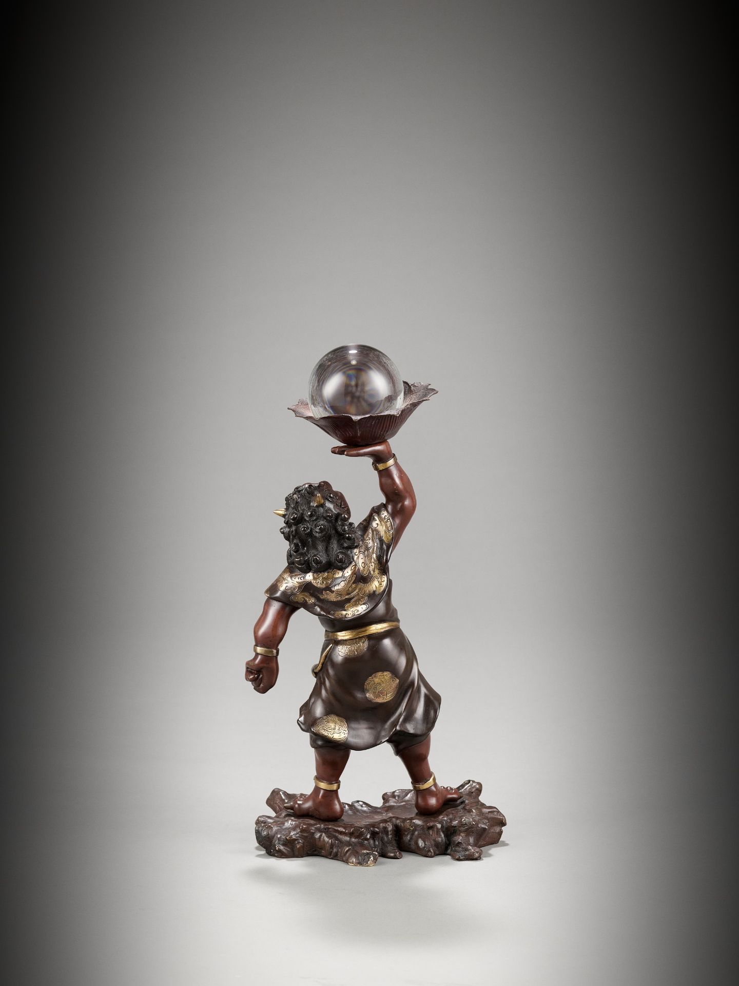 A LARGE PARCEL-GILT BRONZE MIYAO STYLE FIGURE OF AN ONI WITH ROCK CRYSTAL BALL - Image 9 of 12