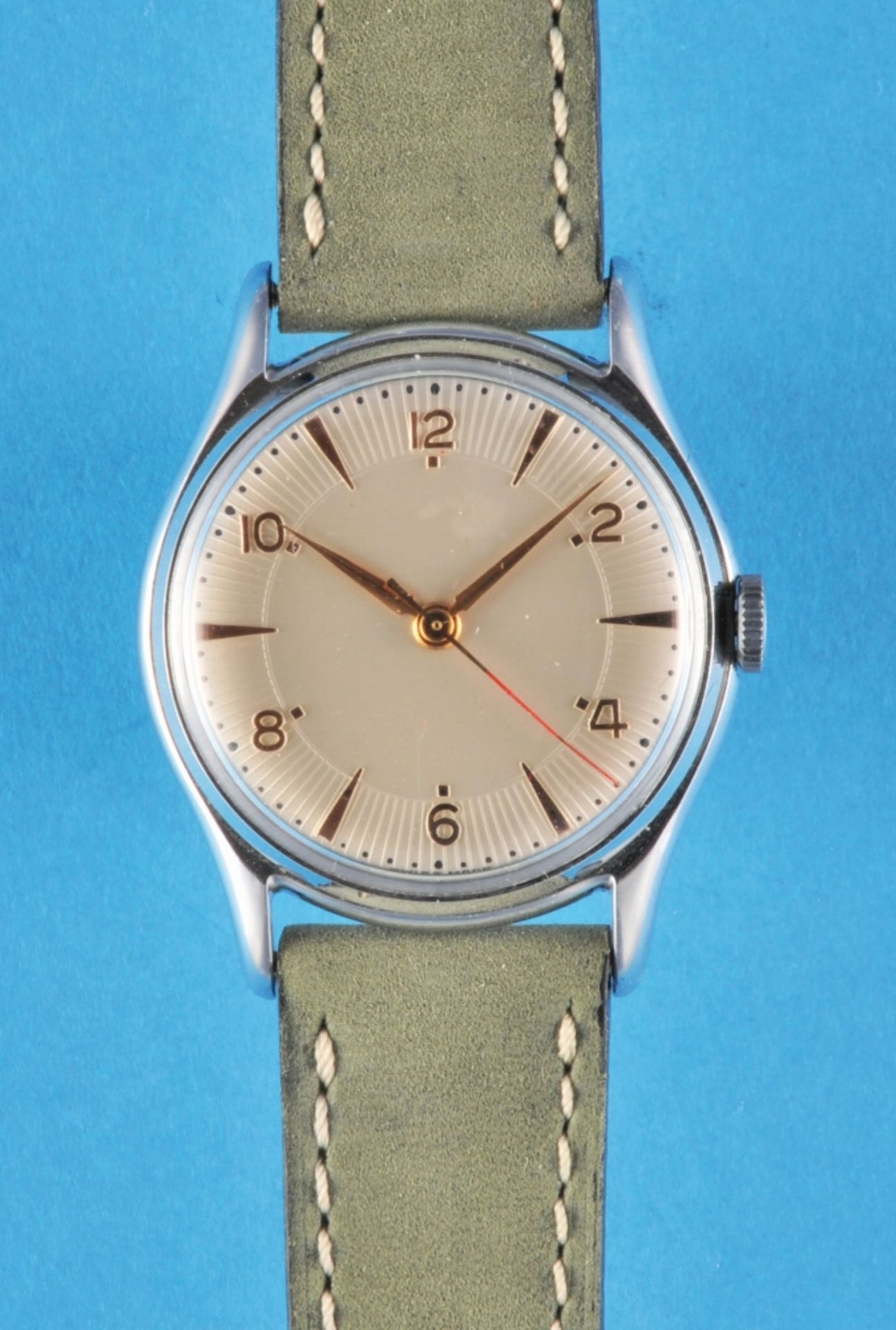 Rare wristwatch with jumping center second