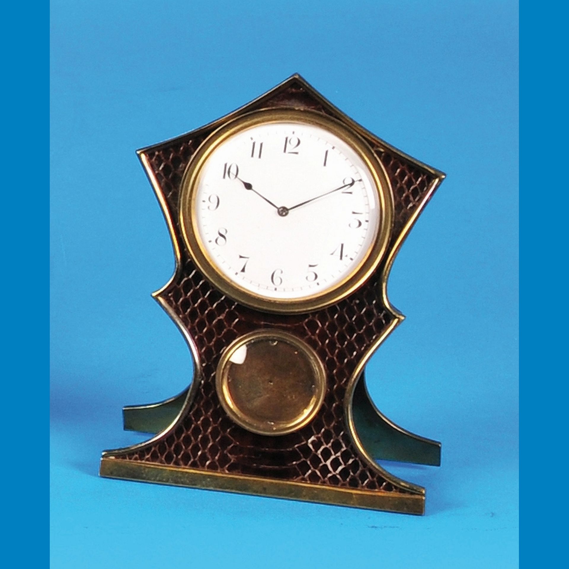 Small 8-days table clock with pocket watch movement and 2 spring houses and mounting brackets