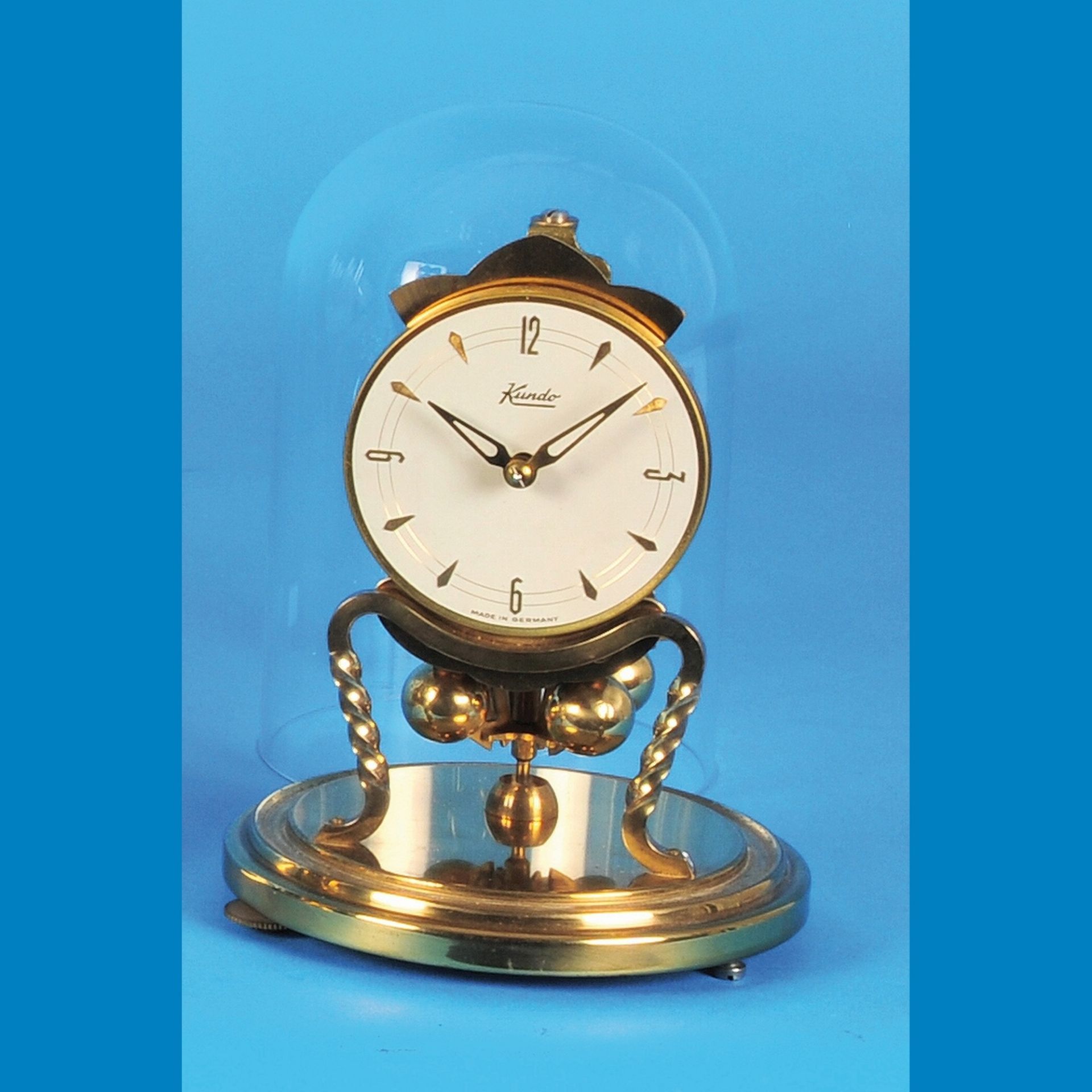 Kundo table clock under glass dome with rotating pendulum, Kieninger & Obergfell