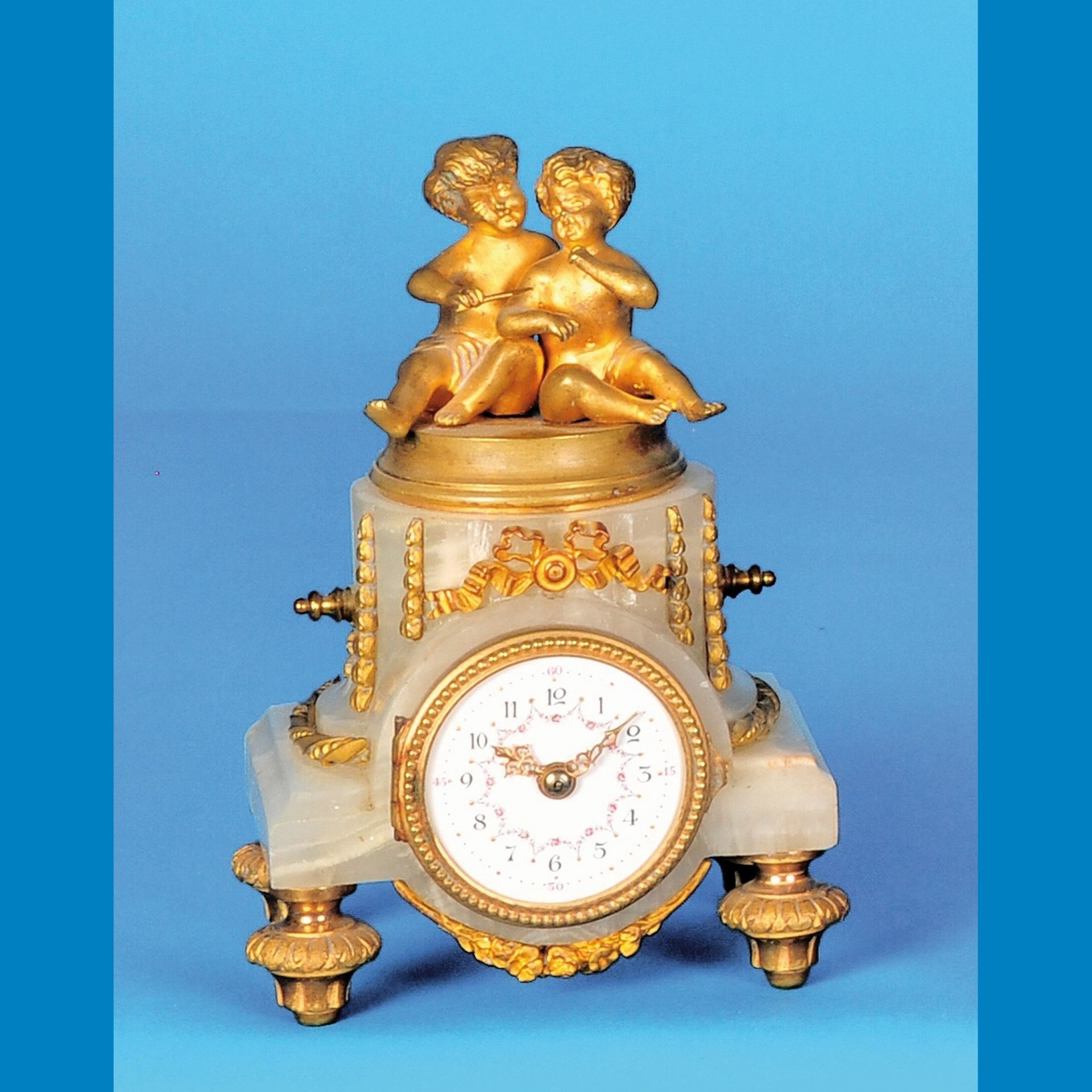 Small alabaster table clock with 8-day movement