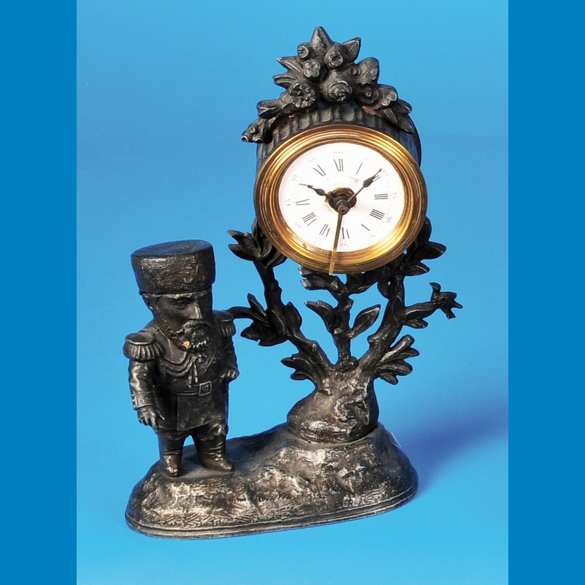 Peldulum alarm clock with russian officer with fold-out headgear
