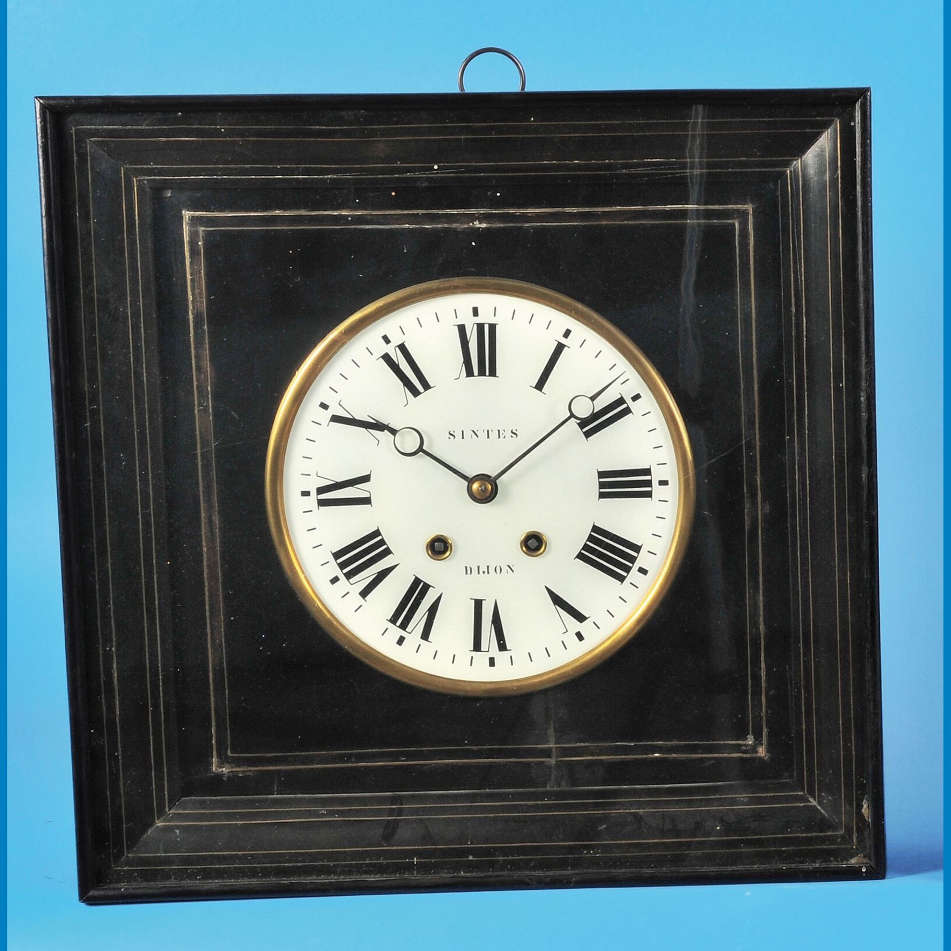 French square frame clock with half-hour strike on gong, signed Sintes Dijon