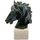 Horse head on a marble base. H 21 cm