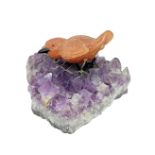 Statuette quartz-amethyst depicting volatile. H cm x 8 cm 12x9.