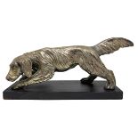 Terracotta statue depicting setter, covered in silver foil, XX century. H 18x33x10 cm