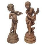 Pair of wooden sculptures of musicians children, early twentieth century. H 42 cm