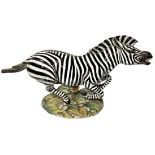 Ronzan, earthenware sculpture depicting Zebra. 30. H cm length 54 cm.