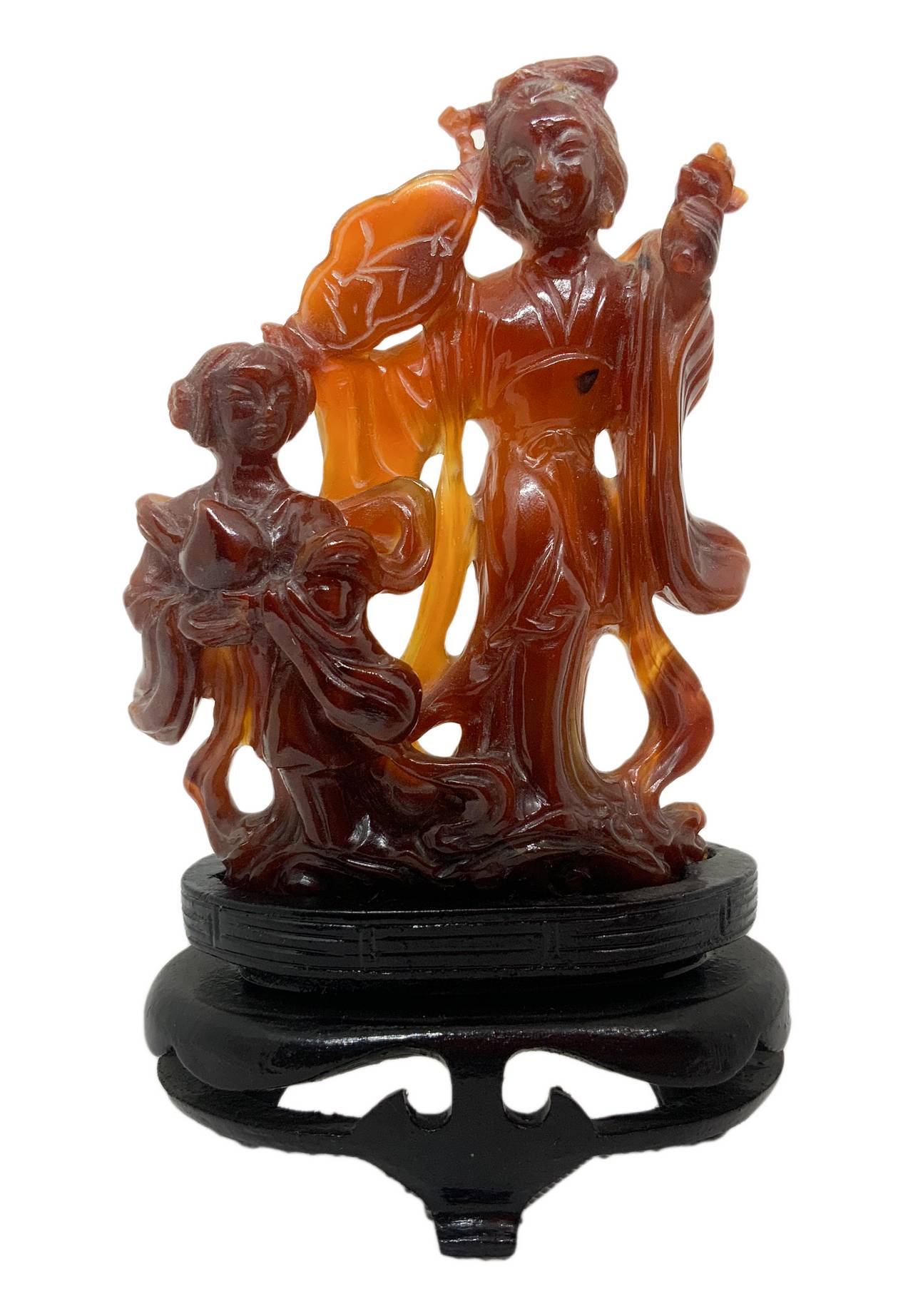 Statuette of brown carnelian depicting "Motherhood" (Guanine with daughter). H cm 11, H cm with base