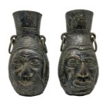 Pair of jugs with faces drawn, bronze, Lima Peru. H Cm 20.5