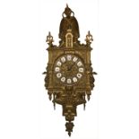 Wall clock, 20th Century, France. In gilded bronze, with porcelain numbers. H 60X18 cm. With key. Ru