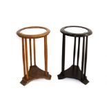 Pair of side table 20's art nouveau wooden, one ebonized both with flat mirror. H 75 cm, 44 cm diame