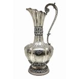 Important pitcher silver, early twentieth secolo.Con handle, lobed body and embossed. H cm 41. 1.474
