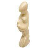 Statuette travertine depicting motherhood. H 16 cm