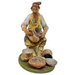 Sculpture in polychrome terracotta of potter at work, Caltagirone, 20th century. H 18 cm