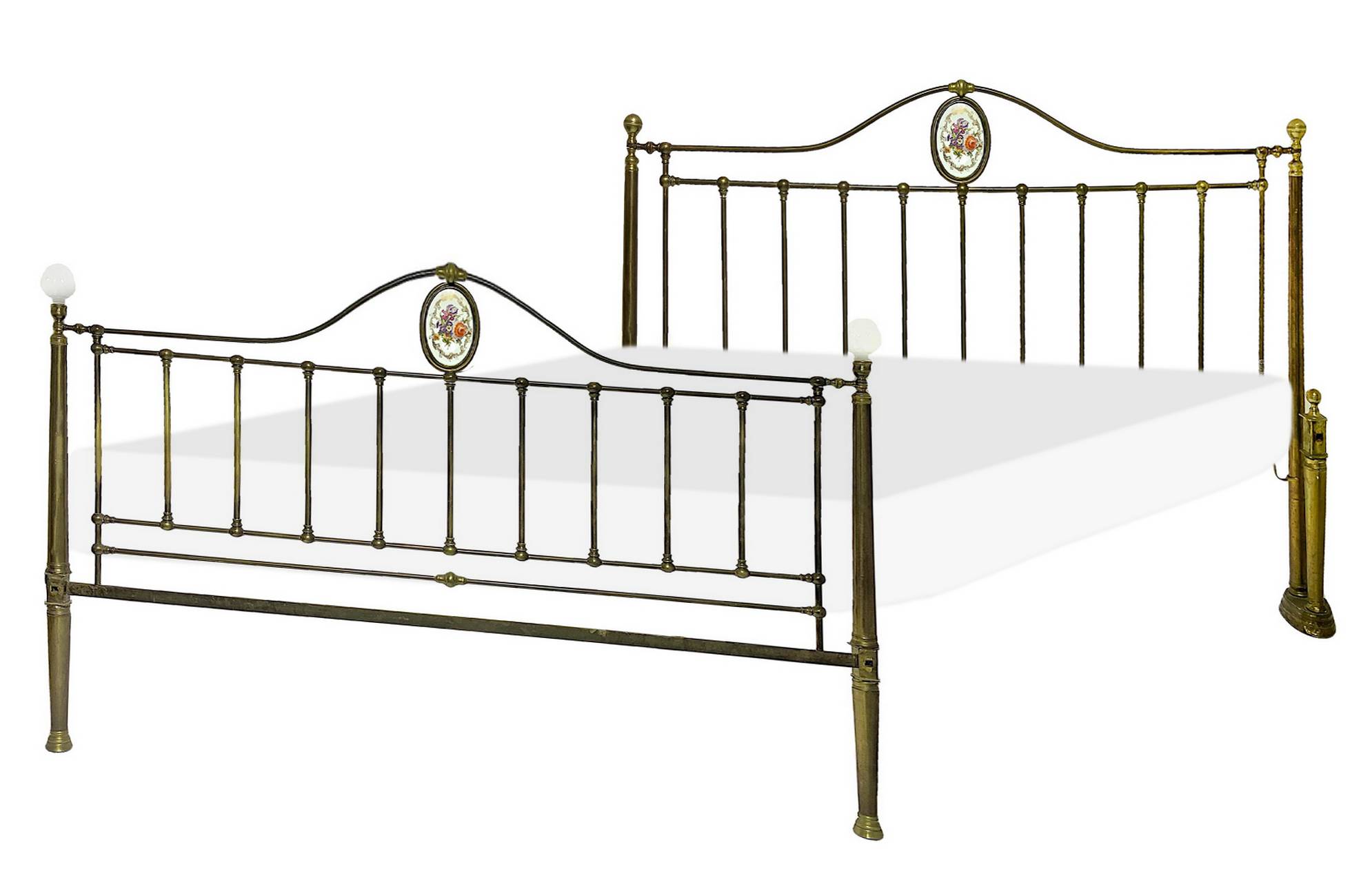 Elegant brass bed frame from the nineteenth century, with porcelain medallion on headboard and footb