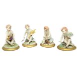 Group of four statues representing the four seasons, porcelain Capodimonte. 20th century. H 9 cm