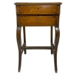 Bedside table with two drawers, Sicily, XIX century. In walnut wood with saber feet. H 90 cm x56x40