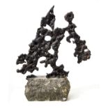 Sculpture 60s, informal style, black granite base, made of cast metal. H 43 cm x 30