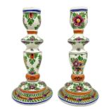 Pair of candlesticks with floral decorations, D.P. Delft, P.M. All. H 20.5 cm