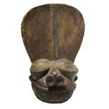 Bamileke Batcham, Mask, Cameroon, early twentieth century. H 82 cm width 40 cm.