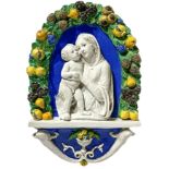 Majolica depicting Virgin Mary with child, the end of the nineteenth century. Copy of "Della Robbia"