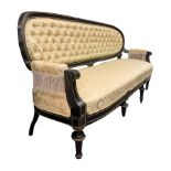 Sofa in black lacquered wood bordered entirely ebonized gilt brass, upholstered in silk damask capit