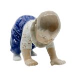 Copenhagen porcelain figurine depicting child who crawls. H 8 cm